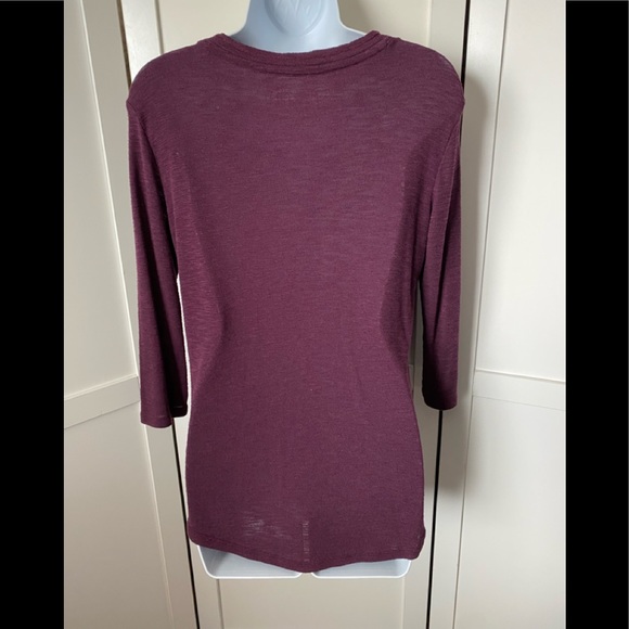 Go Wild top mid sleeves. Pocket in front. Size Med. - Picture 2 of 7